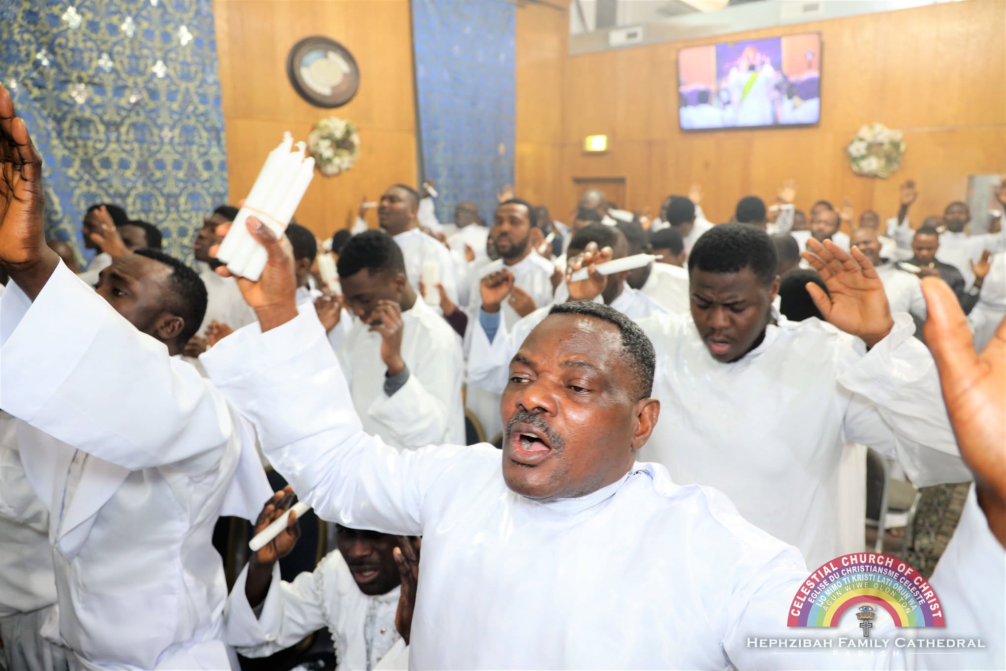 Men gathered in prayer and worship at Hephzibah Family Cathedral