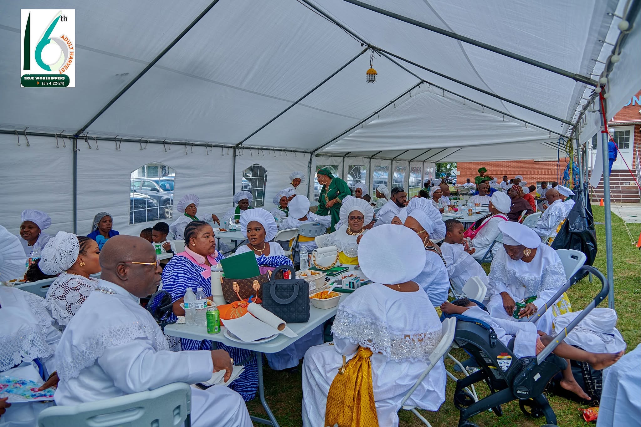 Community members gathered outdoors during a Hephzibah outreach activity