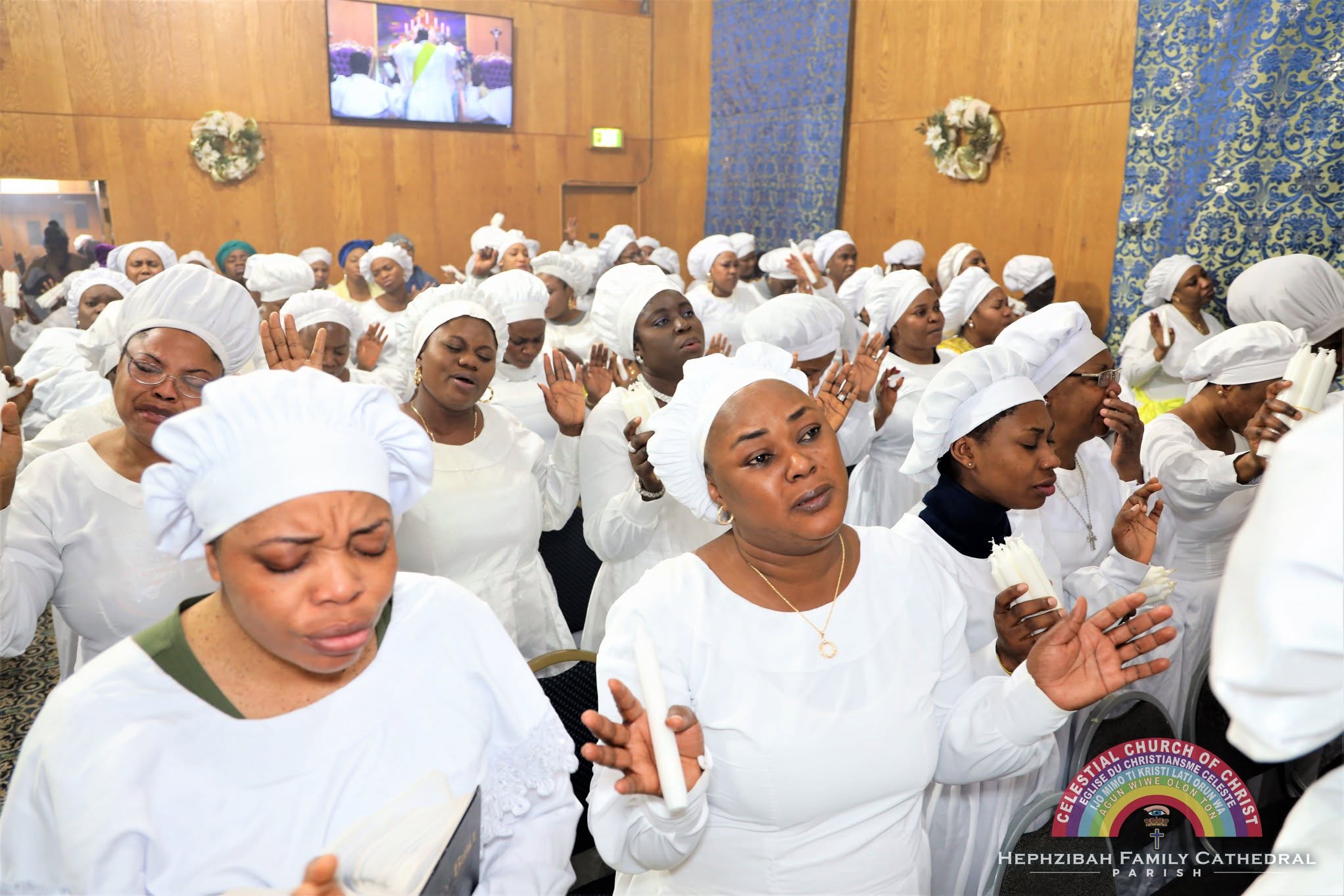 Women worshipping together at Hephzibah Family Cathedral